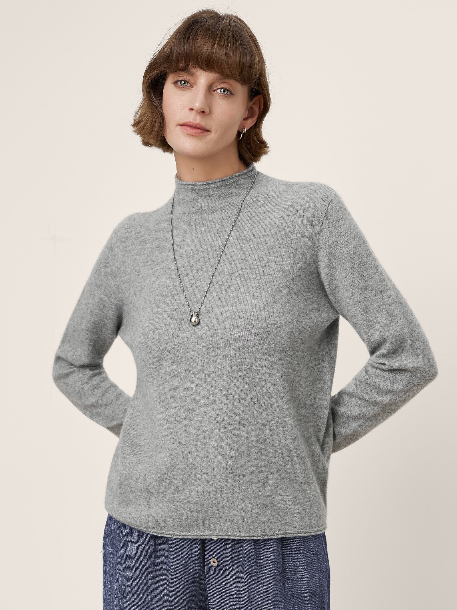 Premium Cashmere Blend Hand-Finished Seamless Mock Neck Lettuce Edge Sweater ZELIE
